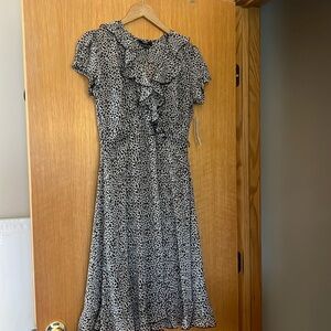 Brand new leopard print midi dress. Tags attached never worn.